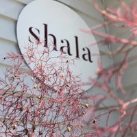a sign with the word shala on it